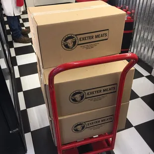two boxes on a cart