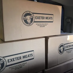 two boxes stacked on top of each other