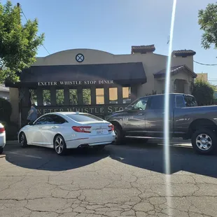 cars parked in front of a building