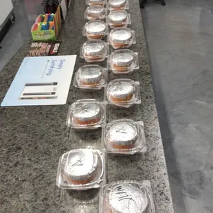 a counter with a variety of pastries