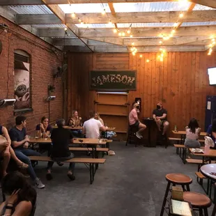 a group of people sitting at tables