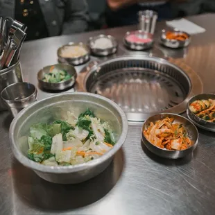 Banchan and complimentary salad