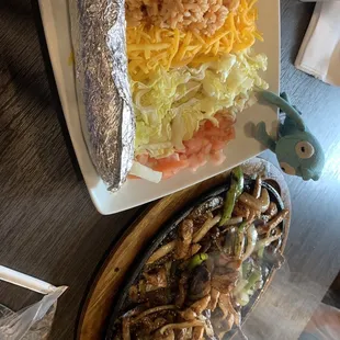 Chicken/steak fajitas. Look at the steam!