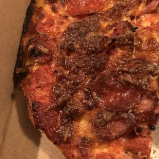 all burnt plastic something here; i don't know what this topping is!