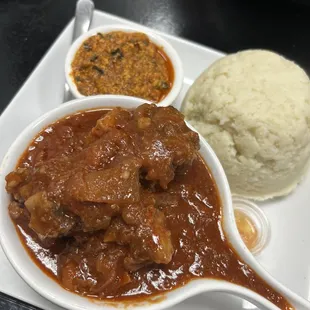Yam fufu, egusi and oxtail