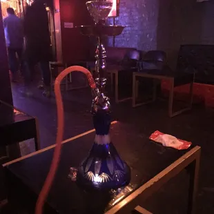 a hookah lounge with a hookah