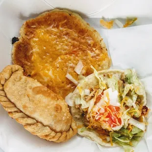 Pineapple-cheese empanadas, chicken taco, and cheese arepa