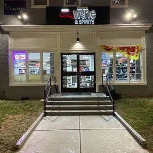 the entrance to a wine and spirits store