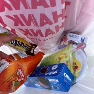 5 items chips , suckers , cookies, banana cookie, gummies