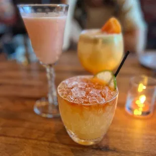 two cocktails on a table