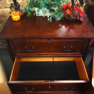 this traditional cherry wood file cabinet with finished backing! This piece is now $425