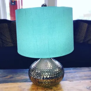 Brighten any room with this modern accent lamp! Teal is such a fun color to decorate your home with. Selling currently for only $39!
