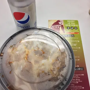 Gorilla Tots come in a different carryout container. Not the styrofoam. Use their menu for scale.