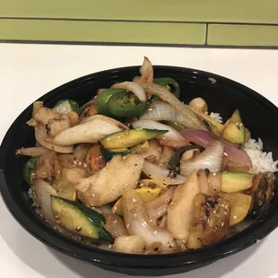 a bowl of stir fried vegetables