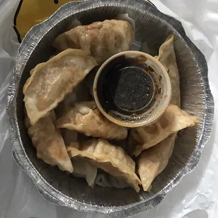 Yummy dumplings. $5.95 on the menu but $6.88 with tax. Worth it though for 16 of them. I got half pan fried and half steamed.