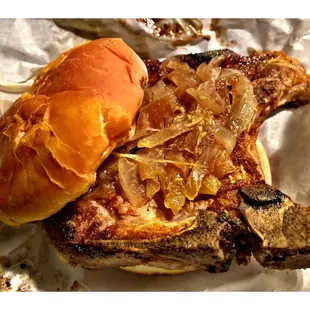 Express Grill.  Simply Pork Chop w/bone  (yellow mustard,grilled onions)Sandwich 5.75$ included Fries! Perfection!