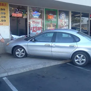 a man standing in front of a car