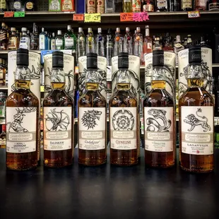 a row of bottles of liquor