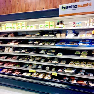 I just realized Grumpy Gary's sausage counter has been covered up by this cooler with sushi, precooked meals &amp; sausage. Gary must be mad!