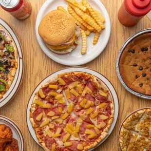 Hawaiian pizza,combination pizza , spicy hot wings, dessert.  Chocolate chip cookie .Chocolate chip brownie