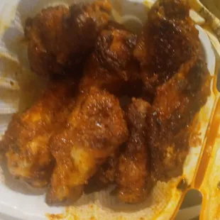 chicken wings in a styrofoam container