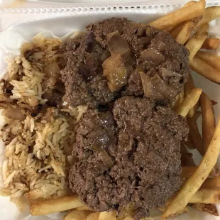 a close up of a meal in a styrofoam container