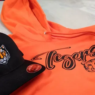Hats and hoodies for local baseball team.