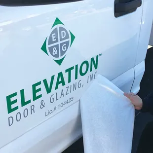 Truck decal installation.