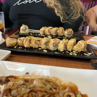 Spicy fried tuna rolls and seafood noodles