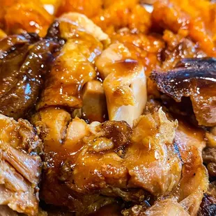 a plate of meat and rice