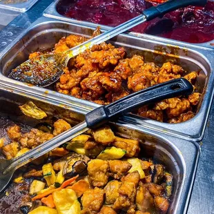 a variety of food items in trays