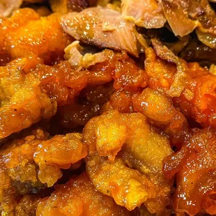 a plate of food with noodles and meat