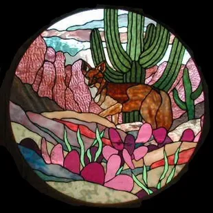 Jennifer's Coyote Landscape design. Handrolled and Handblown Antique glasses are featured.