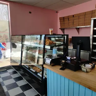 a counter with a variety of baked goods