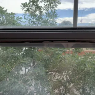 The window frames were so broken, the pane was loose.