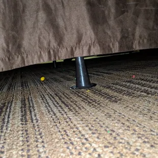 Candy and dirt under the bed