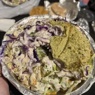 Extreme chicken bowl with cilantro jalapeño hummus