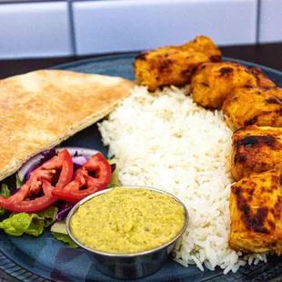 Chicken Kebob: Marinated chicken grilled to perfection and served off the skewer