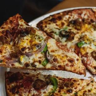 a slice taken out of a pizza