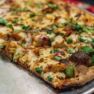 a close up of a pizza