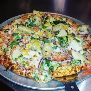 a pizza on a pizza pan