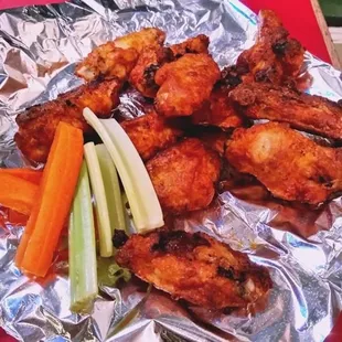 chicken wings, carrots, celery, and celery sticks