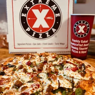 Up The Creek - Italian sausage, savory tomato sauce, goat cheese, mozzarella, baby spinach, roasted red peppers, roasted garlic and oregano.