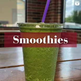 a smoothie with a purple straw