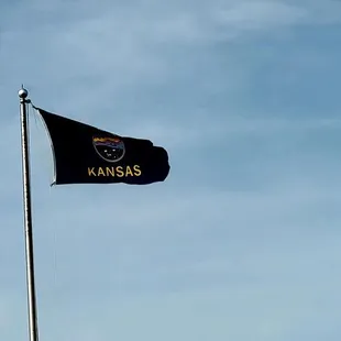 two flags flying in the wind