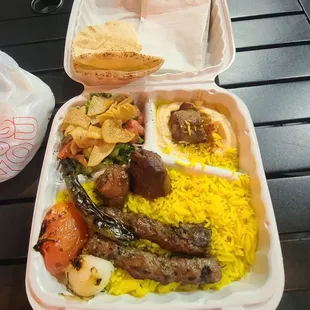 Half kafta, half steak kabob platter that comes with saffron rice, hummus, pita bread &amp; a side salad with a dressing to die for!