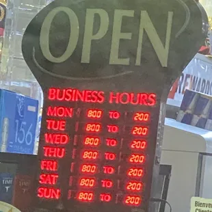 a business hours sign