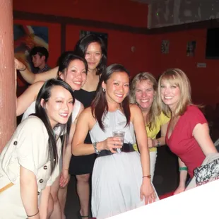 a group of women posing for a picture