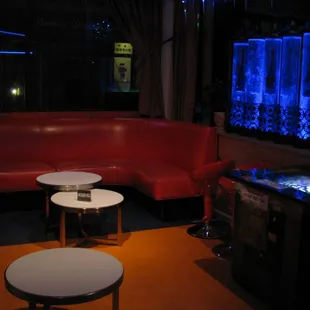 a red booth with a blue light