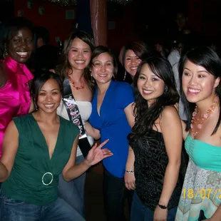 a group of women posing for a picture